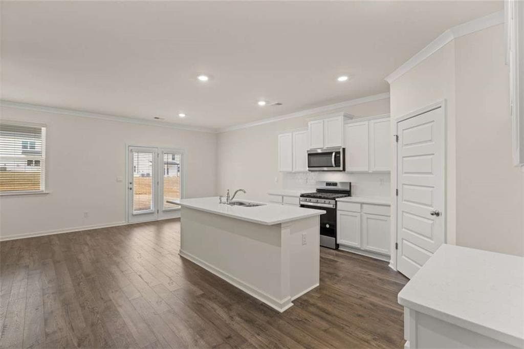 5 bedroom, 3 bathroom, 2,614 sq ft single family residence for sale at 3099 Champions Way, Loganville, GA 30052 — photo 5