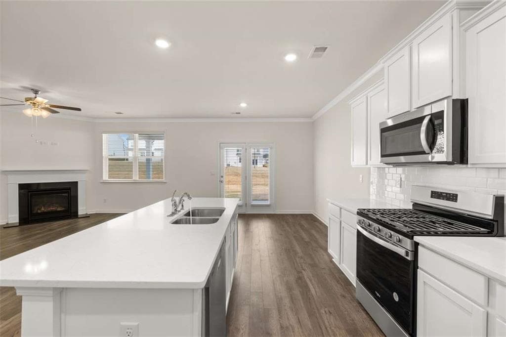 5 bedroom, 3 bathroom, 2,614 sq ft single family residence for sale at 3099 Champions Way, Loganville, GA 30052 — photo 8