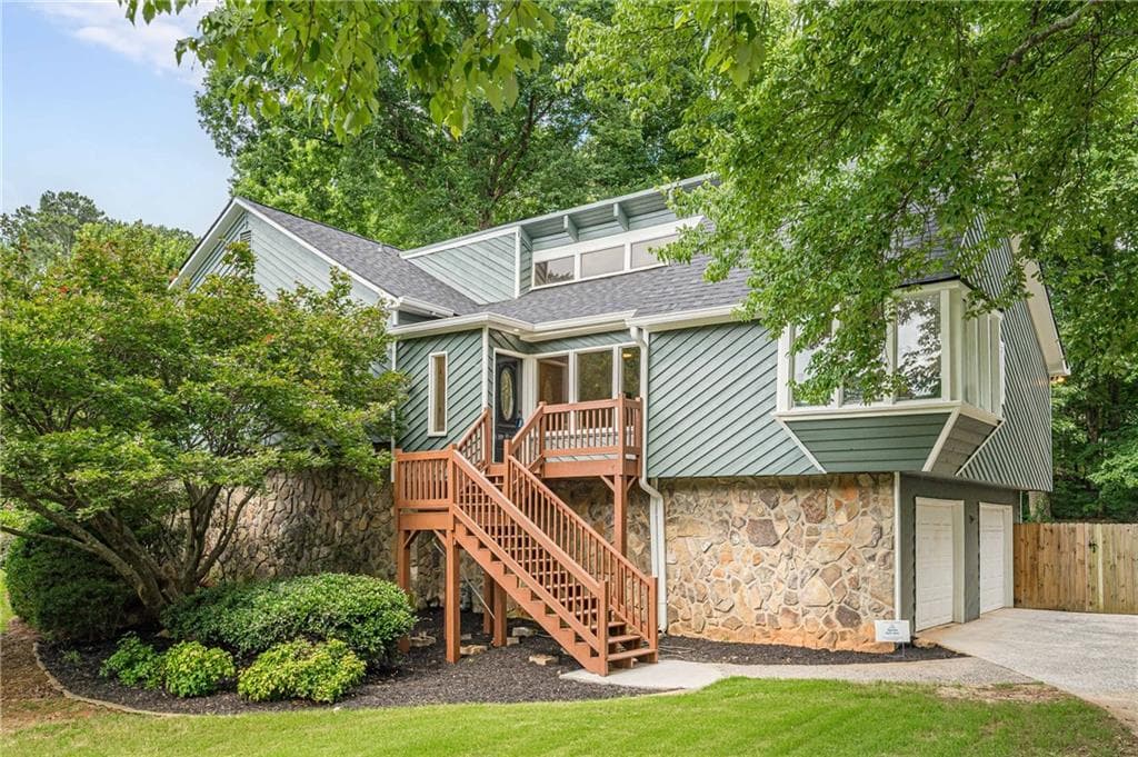 5 bedroom, 4 bathroom, 3,070 sq ft single family residence sold at 2771 Interlaken Drive, Marietta, GA 30062