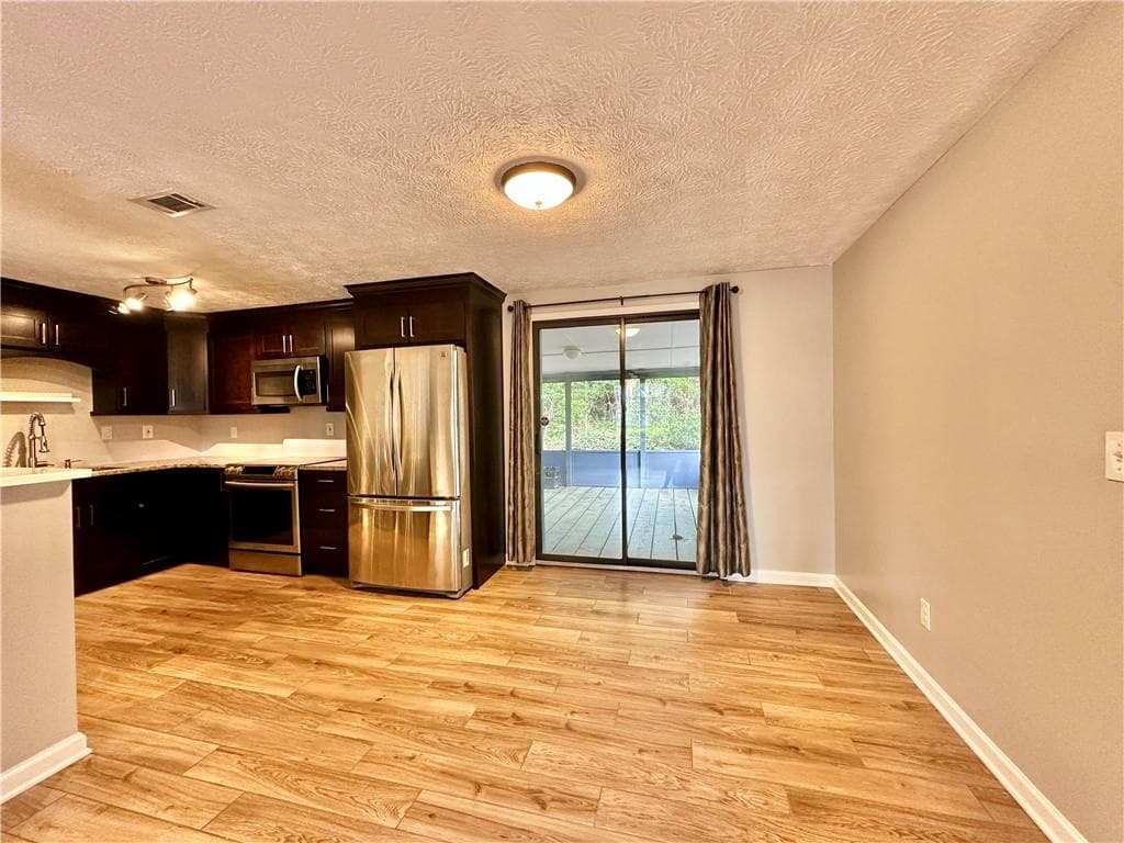 3 bedroom, 1 bathroom, 1,080 sq ft single family residence for rent at 2848 Ancient Oak Court, Snellville, GA 30078 for $1,900 a month — photo 6