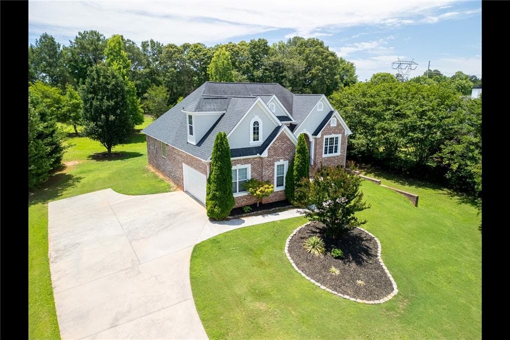 6 bedroom, 5 bathroom, 4,964 sq ft single family residence for sale at 3207 Brigadier Way, Stockbridge, GA 30281 — photo 2