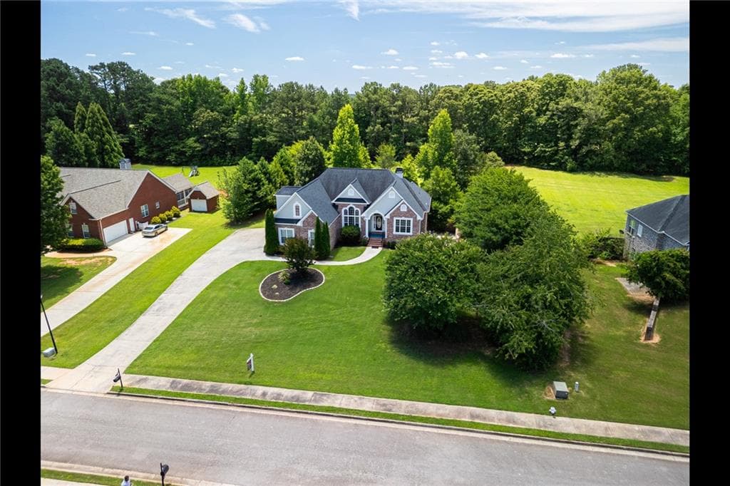 6 bedroom, 5 bathroom, 4,964 sq ft single family residence for sale at 3207 Brigadier Way, Stockbridge, GA 30281 — photo 3