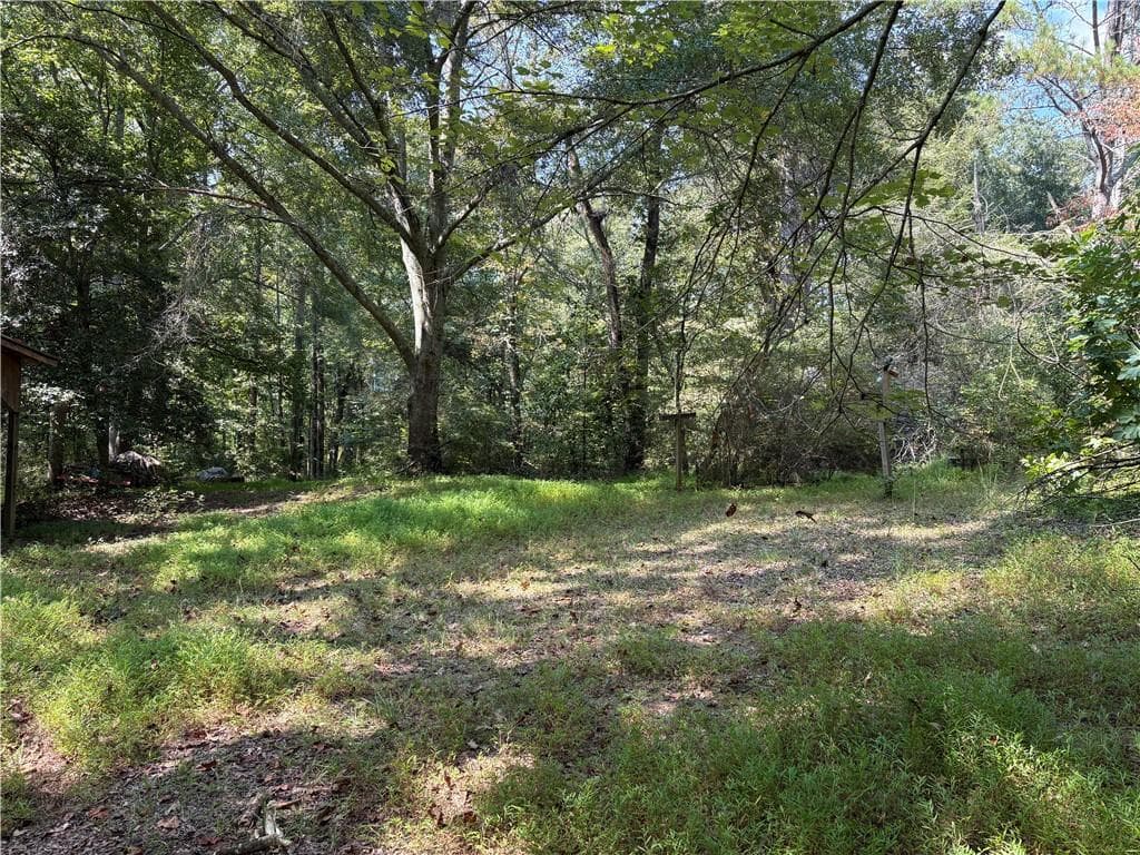 4 bedroom, 2 bathroom single family residence for sale at 6485 Forsyth Drive, Cumming, GA 30028 — photo 9