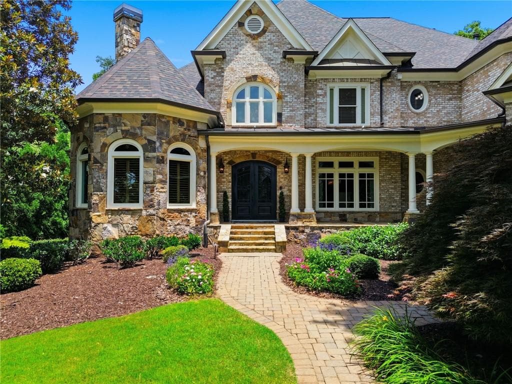 5 bedroom, 7 bathroom, 8,114 sq ft single family residence for sale at 2830 Manor Bridge Drive, Alpharetta, GA 30004 — photo 2