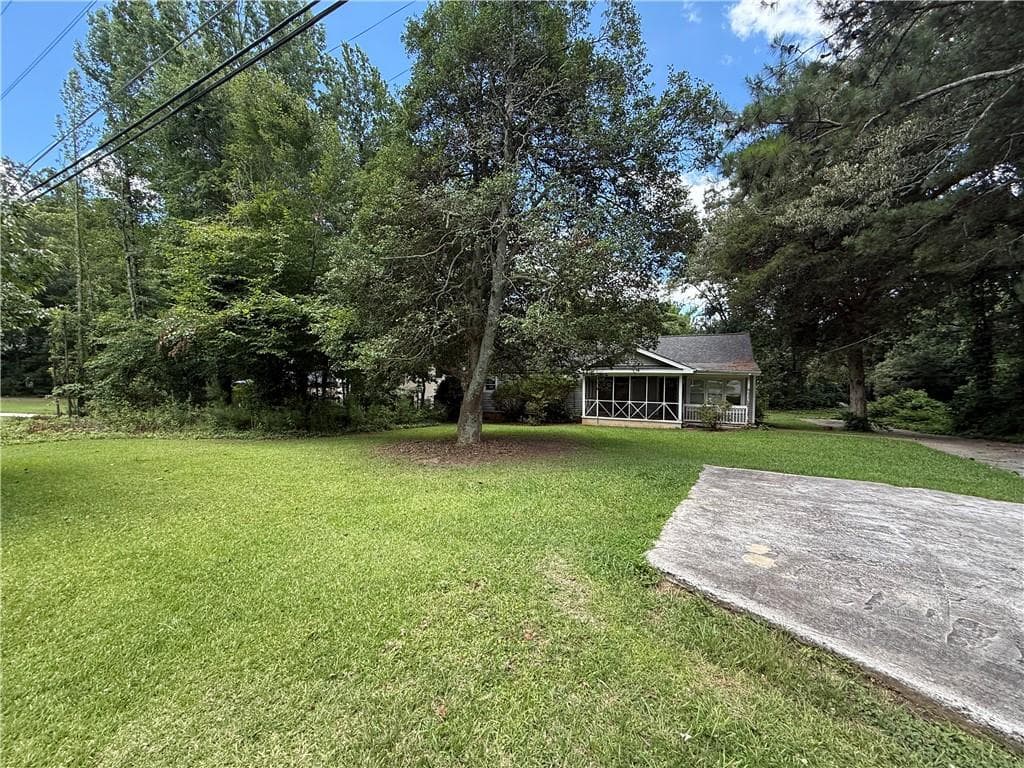 3 bedroom, 2 bathroom, 1,973 sq ft single family residence for sale at 1363 Boat Rock Road, Atlanta, GA 30331 — photo 2