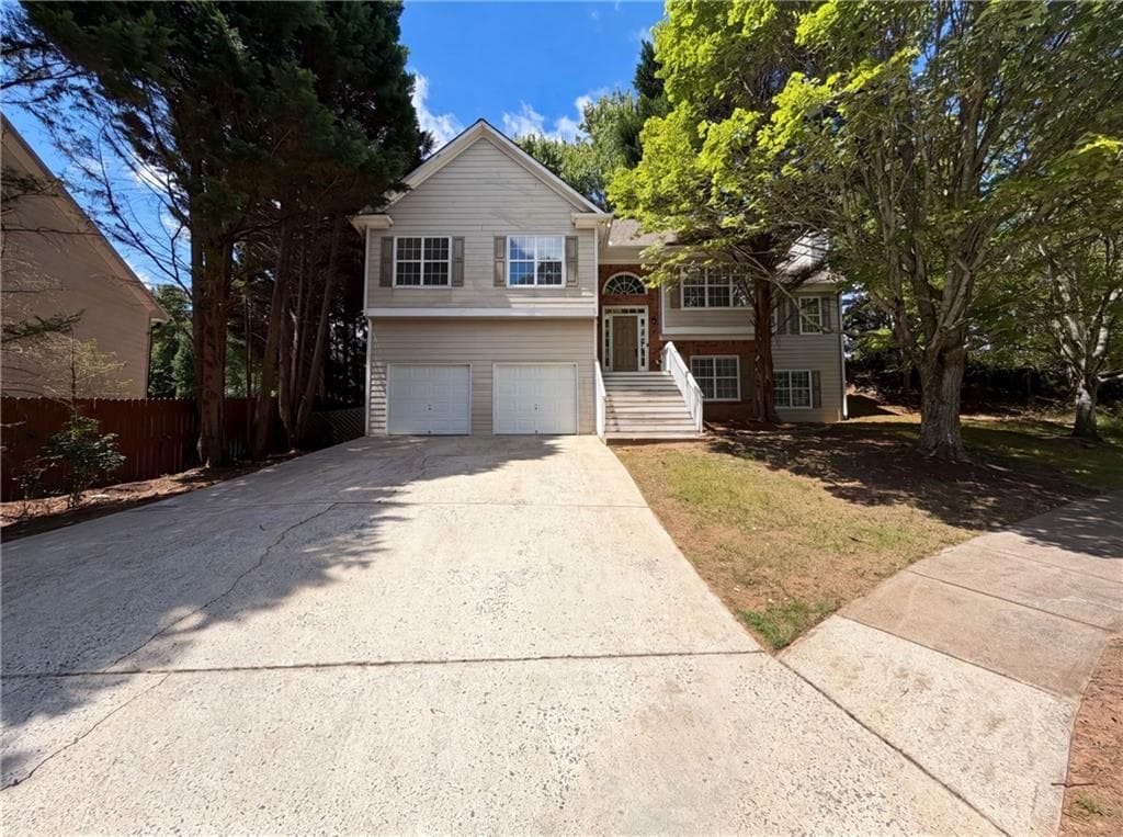 4 bedroom, 3 bathroom, 2,408 sq ft single family residence for sale at 3912 Mcguire Way, Kennesaw, GA 30144 — photo 1 of 20