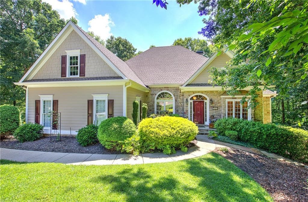 5 bedroom, 4 bathroom, 4,357 sq ft single family residence for sale at 302 Waterfall Court, Canton, GA 30115 — photo 1 of 81