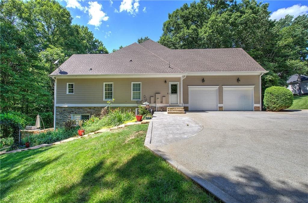 5 bedroom, 4 bathroom, 4,357 sq ft single family residence for sale at 302 Waterfall Court, Canton, GA 30115 — photo 3