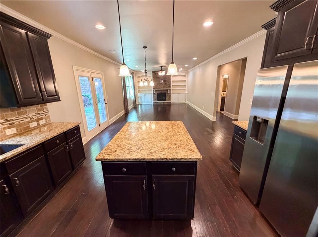 7 bedroom, 5 bathroom, 4,561 sq ft single family residence for sale at 8785 Ellesmere Drive, Cumming, GA 30041 — photo 2