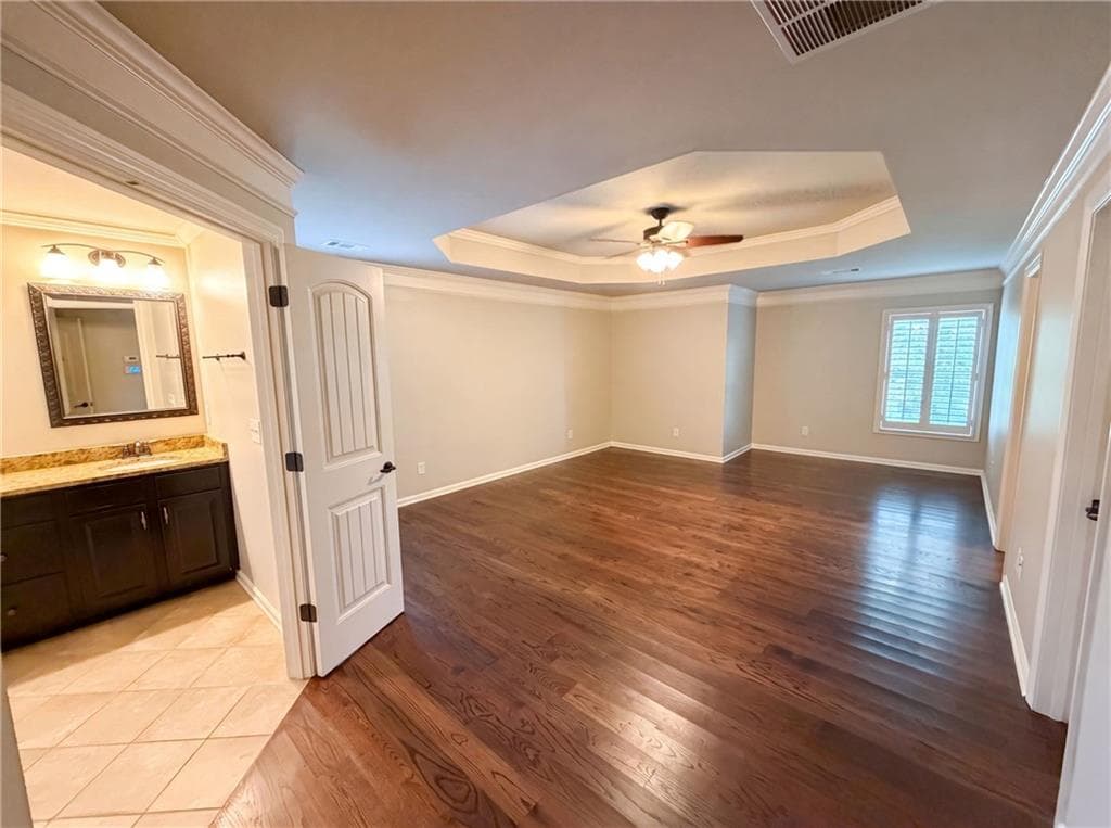 7 bedroom, 5 bathroom, 4,561 sq ft single family residence for sale at 8785 Ellesmere Drive, Cumming, GA 30041 — photo 4