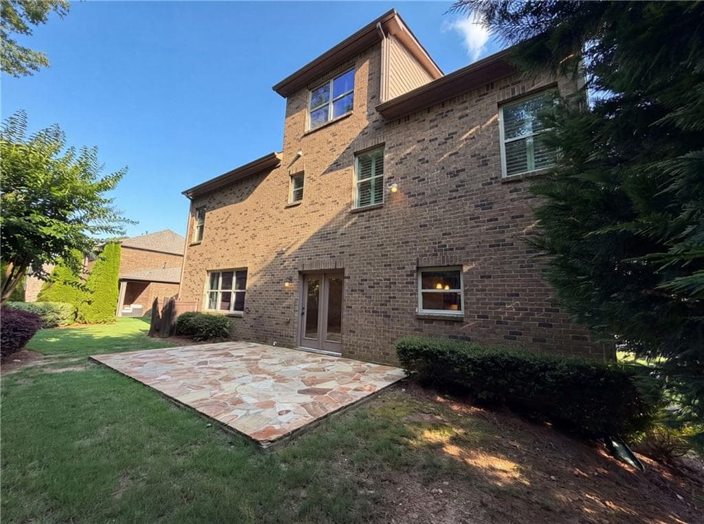 7 bedroom, 5 bathroom, 4,561 sq ft single family residence for sale at 8785 Ellesmere Drive, Cumming, GA 30041 — photo 5