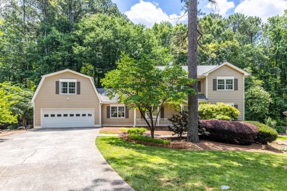 5 bedroom, 3 bathroom, 3,020 sq ft single family residence for sale at 1025 Foxfire Drive, Lawrenceville, GA 30044 — photo 2