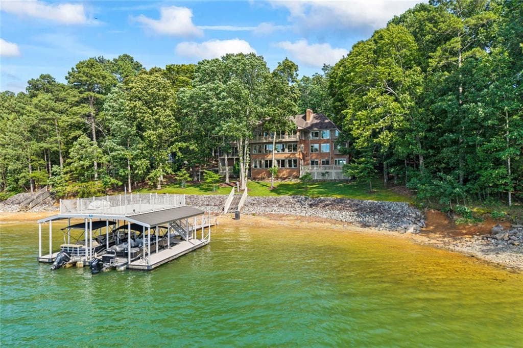 7 bedroom, 8 bathroom, 9,346 sq ft single family residence for sale at 6576 Yacht Club Road, Flowery Branch, GA 30542