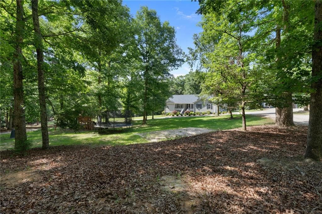 4 bedroom, 2 bathroom, 2,612 sq ft single family residence for sale at 2502 Flat Shoals Road, Conyers, GA 30094 — photo 3