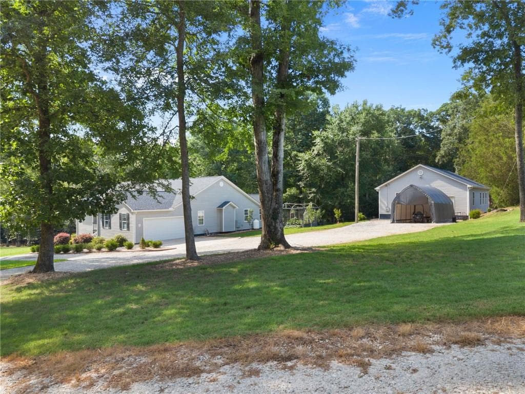 4 bedroom, 2 bathroom, 2,612 sq ft single family residence for sale at 2502 Flat Shoals Road, Conyers, GA 30094 — photo 5