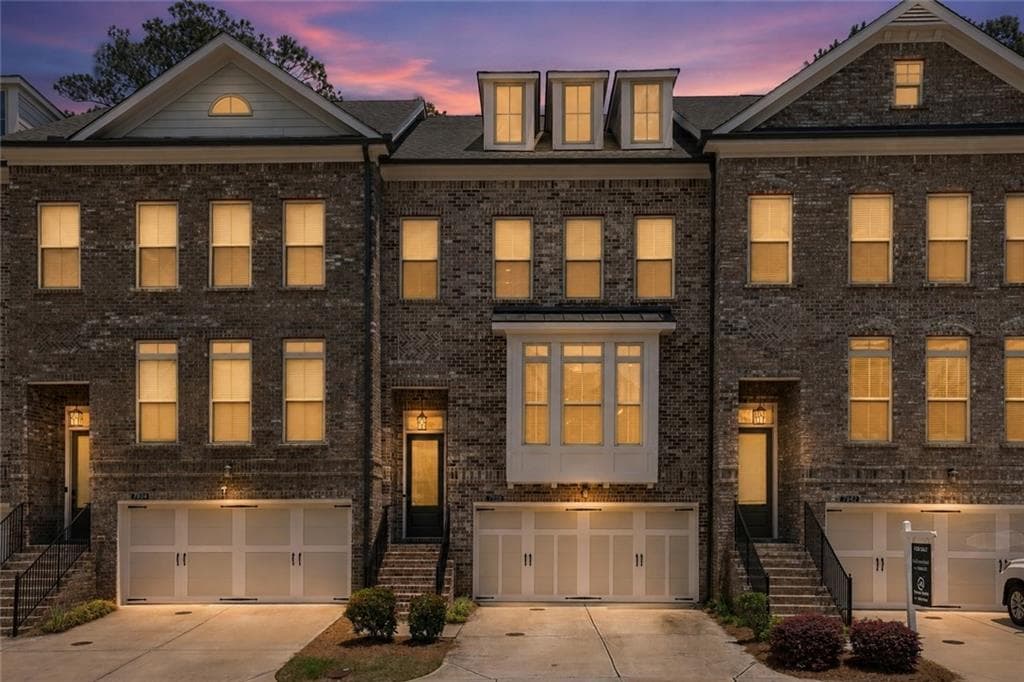 4 bedroom, 4 bathroom, 2,363 sq ft townhouse for sale at 7938 Laurel Crest Drive, Suwanee, GA 30024