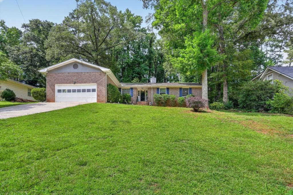 3 bedroom, 3 bathroom, 2,015 sq ft single family residence for sale at 716 Bruce Way, Lilburn, GA 30047 — photo 2