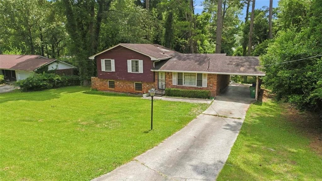 4 bedroom, 2 bathroom, 1,876 sq ft single family residence for sale at 3246 Weslock Circle, Decatur, GA 30034 — photo 2