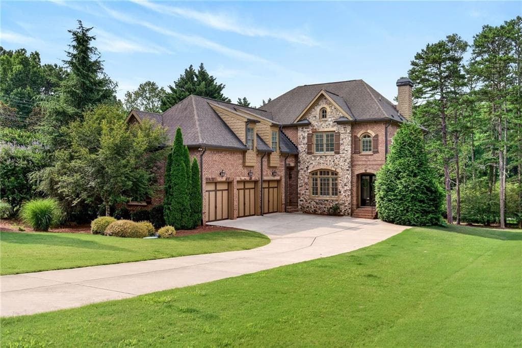 7 bedroom, 6 bathroom, 5,642 sq ft single family residence for sale at 483 McGinnis Way, Milton, GA 30004 — photo 1 of 71