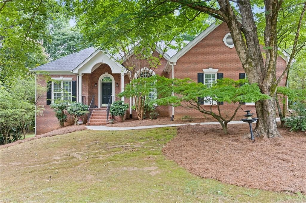 4 bedroom, 3 bathroom, 3,660 sq ft single family residence sold at 815 Cedar Creek Drive, Suwanee, GA 30024