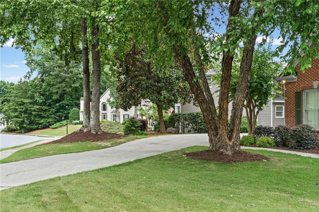 5 bedroom, 4 bathroom, 4,126 sq ft single family residence for sale at 10565 Cauley Creek Drive, Johns Creek, GA 30097 — photo 3