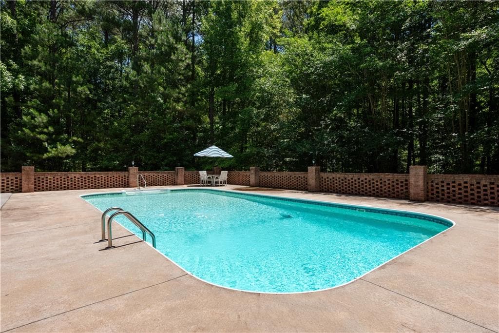 5 bedroom, 5 bathroom, 3,082 sq ft single family residence for sale at 3010 Kari Brook Lane, Monroe, GA 30655 — photo 2