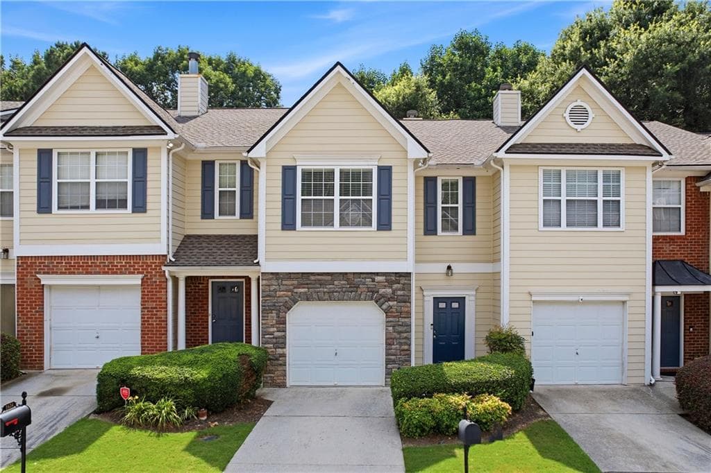 3 bedroom, 3 bathroom, 1,594 sq ft townhouse for sale at 1622 Jackson Way, Atlanta, GA 30318 — photo 1 of 23