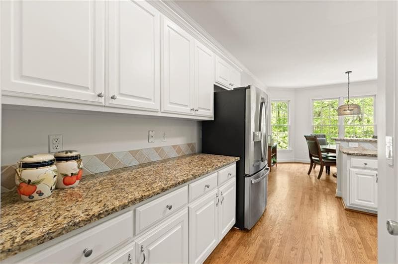 5 bedroom, 4 bathroom, 4,120 sq ft single family residence for sale at 4425 Woodside Court, Cumming, GA 30041 — photo 10