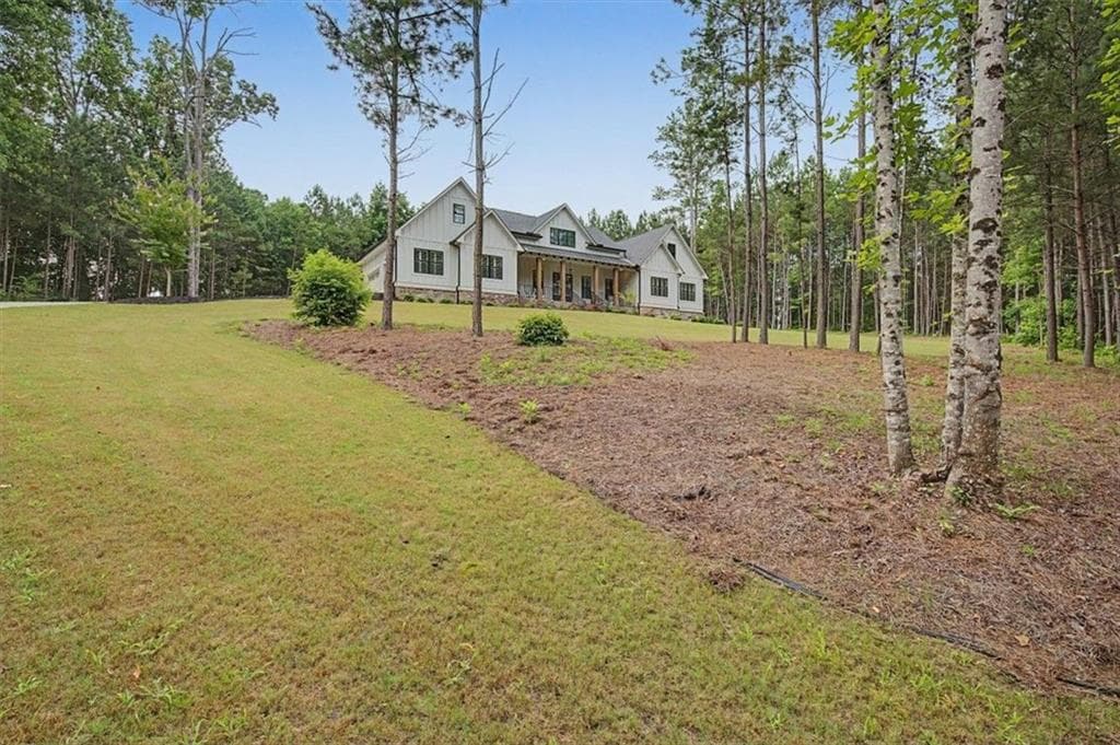 5 bedroom, 5 bathroom, 4,062 sq ft single family residence for sale at 70 Bristol Road, Ball Ground, GA 30107 — photo 3