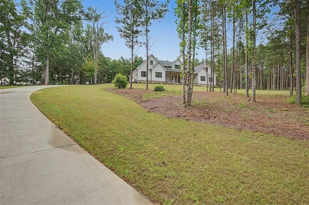 5 bedroom, 5 bathroom, 4,062 sq ft single family residence for sale at 70 Bristol Road, Ball Ground, GA 30107 — photo 4