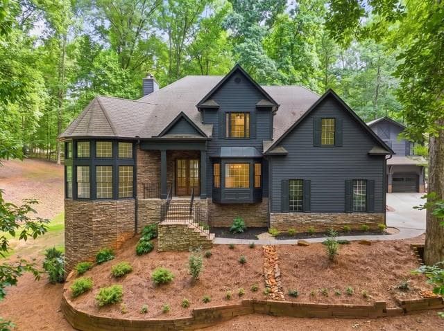 5 bedroom, 4 bathroom, 6,580 sq ft single family residence for sale at 550 Eagles Landing Drive, Alpharetta, GA 30004 — photo 1 of 117