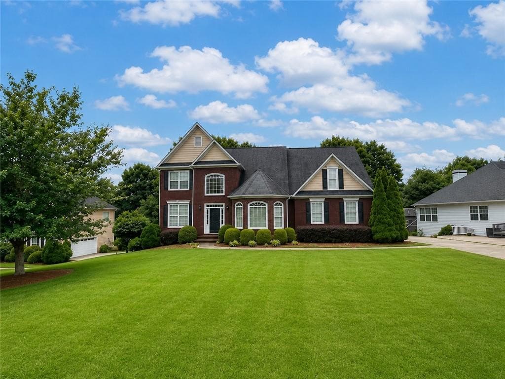 7 bedroom, 4 bathroom, 4,143 sq ft single family residence for sale at 4010 Magnolia Leaf Lane, Suwanee, GA 30024