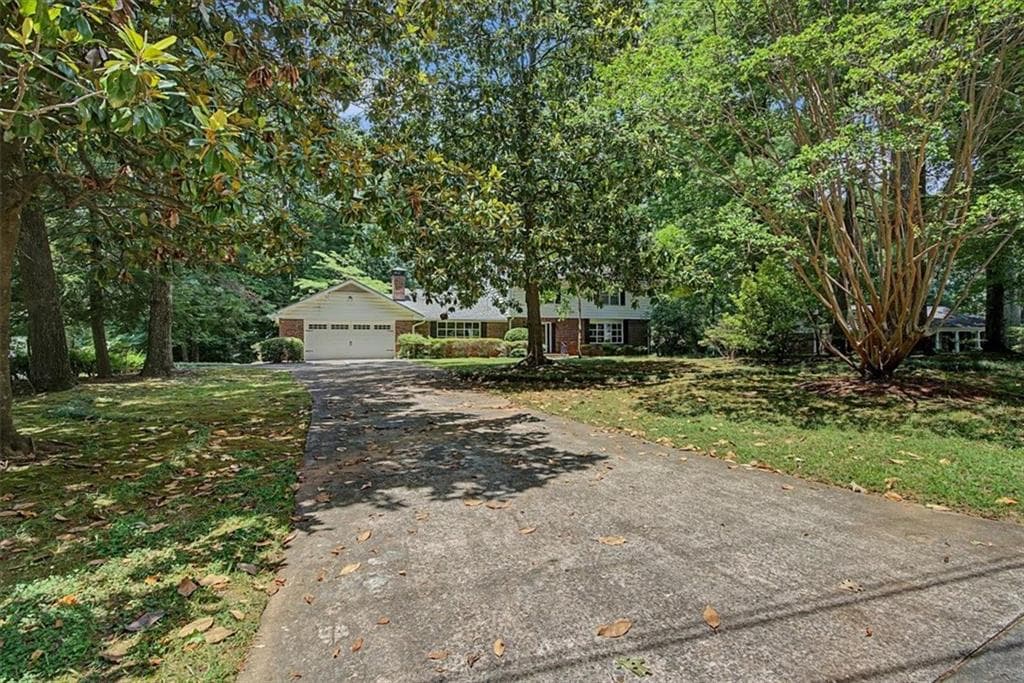 4 bedroom, 3 bathroom, 3,190 sq ft single family residence for sale at 483 Summit Ridge Drive, Lawrenceville, GA 30046 — photo 1 of 38