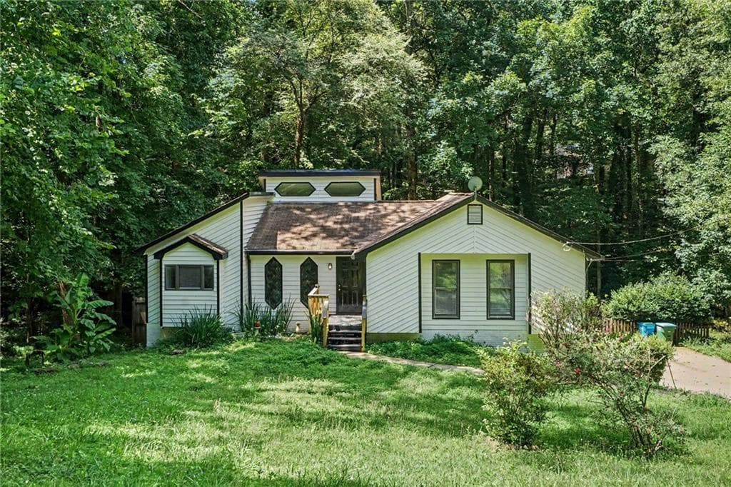 4 bedroom, 3 bathroom, 1,558 sq ft single family residence for sale at 1373 Fairfield Drive, Lilburn, GA 30047