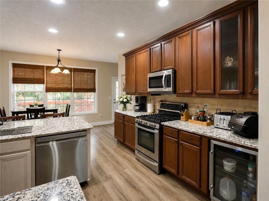 7 bedroom, 4 bathroom, 4,143 sq ft single family residence for sale at 4010 Magnolia Leaf Lane, Suwanee, GA 30024 — photo 9
