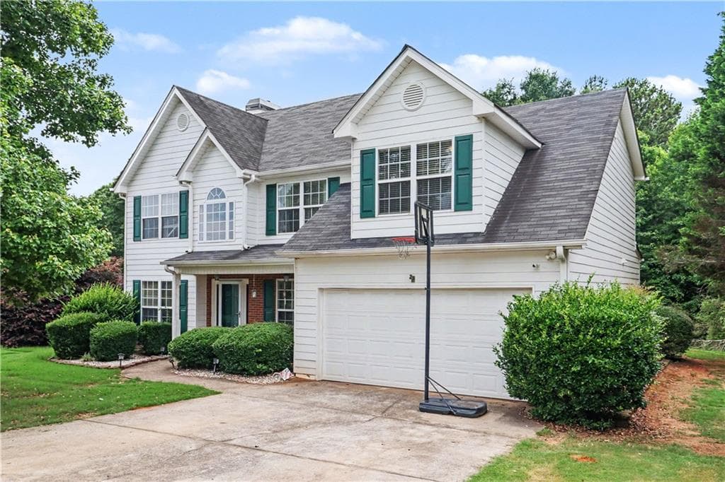 5 bedroom, 3 bathroom, 2,575 sq ft single family residence for sale at 974 Coosawilla Drive, Winder, GA 30680 — photo 2