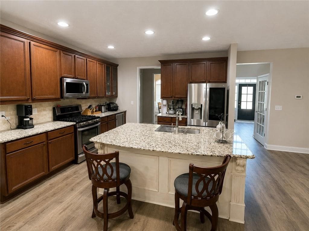 7 bedroom, 4 bathroom, 4,143 sq ft single family residence for sale at 4010 Magnolia Leaf Lane, Suwanee, GA 30024 — photo 8