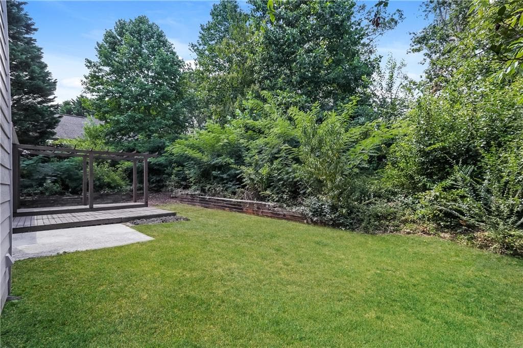 4 bedroom, 3 bathroom, 2,636 sq ft single family residence for sale at 7340 Lanier Cove Court, Cumming, GA 30041 — photo 3