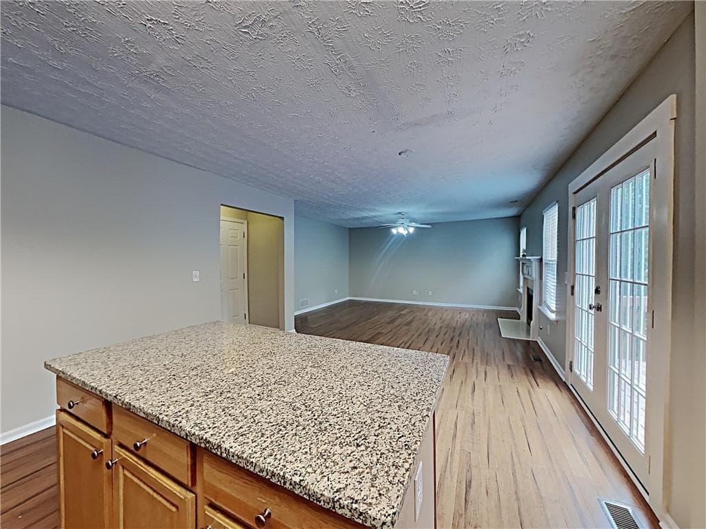 4 bedroom, 3 bathroom, 2,000 sq ft single family residence for sale at 825 Roxfield Court, Buford, GA 30518 — photo 10