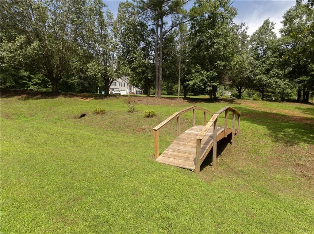 4 bedroom, 3 bathroom, 1,668 sq ft single family residence for sale at 116 Duncans Mill Drive, Locust Grove, GA 30248 — photo 3
