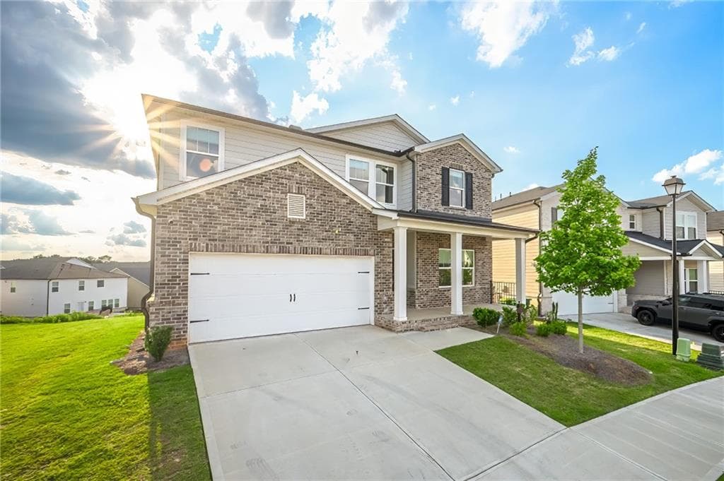 5 bedroom, 3 bathroom, 2,818 sq ft single family residence for sale at 2012 Baron Manor Drive, Lawrenceville, GA 30044 — photo 2