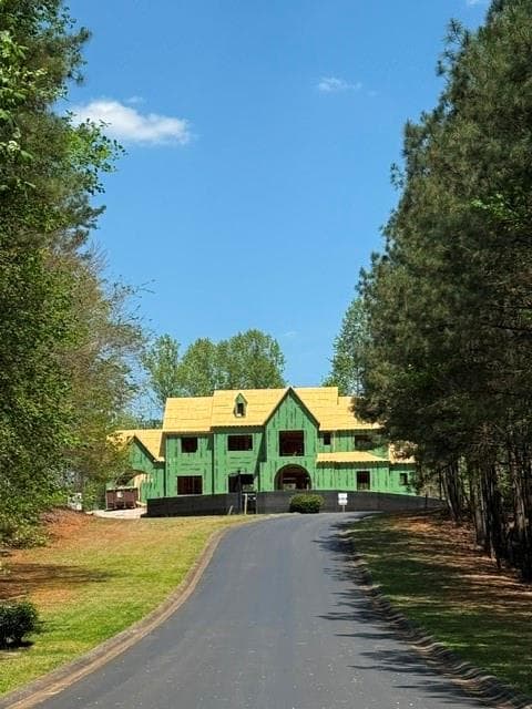 6 bedroom, 8 bathroom, 8,787 sq ft single family residence for sale at 1000 Overlook Terrace, Ball Ground, GA 30107 — photo 2