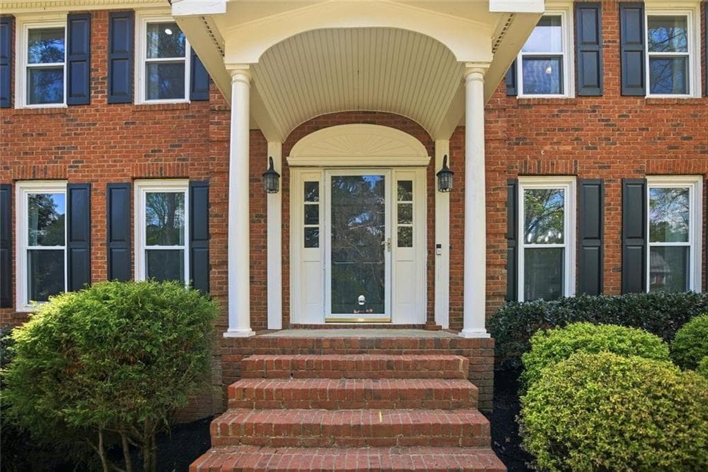4 bedroom, 3 bathroom, 4,256 sq ft single family residence for sale at 104 Crabapple Springs Drive, Woodstock, GA 30188 — photo 3