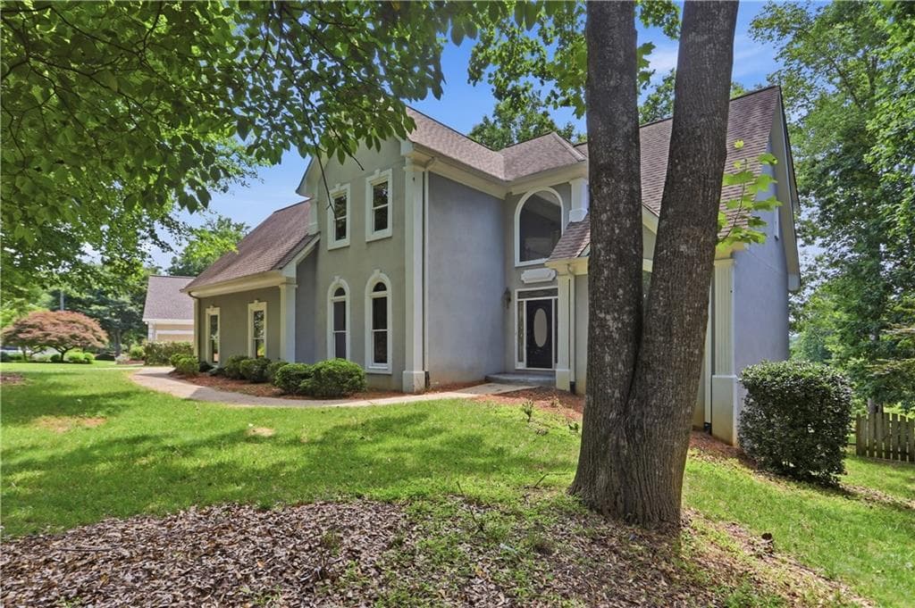 5 bedroom, 4 bathroom, 4,564 sq ft single family residence for sale at 3044 Eagle Watch Drive, Woodstock, GA 30189 — photo 2