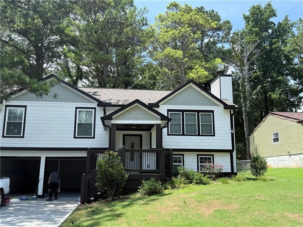 4 bedroom, 3 bathroom, 1,825 sq ft single family residence for sale at 2103 Singer Way, Lithonia, GA 30058 — photo 2