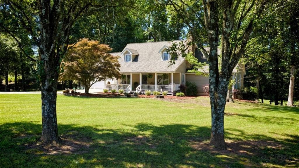 5 bedroom, 4 bathroom, 3,878 sq ft single family residence for sale at 211 Little New York Road, Carrollton, GA 30116 — photo 2