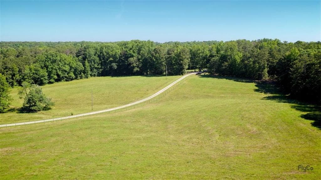 5 bedroom, 4 bathroom, 3,878 sq ft single family residence for sale at 211 Little New York Road, Carrollton, GA 30116 — photo 3