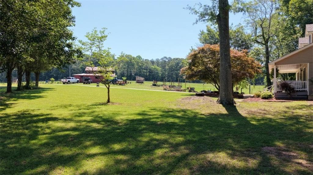 5 bedroom, 4 bathroom, 3,878 sq ft single family residence for sale at 211 Little New York Road, Carrollton, GA 30116 — photo 6