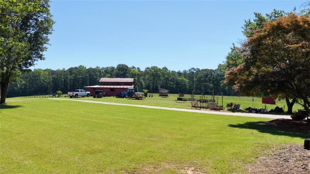5 bedroom, 4 bathroom, 3,878 sq ft single family residence for sale at 211 Little New York Road, Carrollton, GA 30116 — photo 8