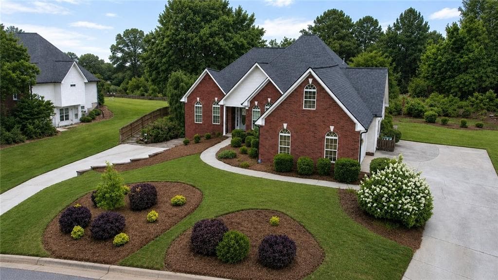 5 bedroom, 4 bathroom, 4,738 sq ft single family residence for sale at 6015 Cedar Lake Trail, Loganville, GA 30656 — photo 2